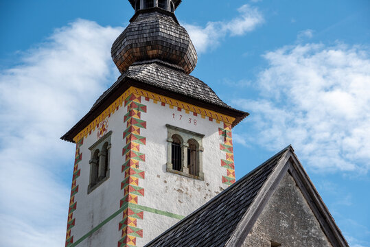 Old church St. John the Baptist at Lake Bohinj in the Triglav National Park, The Julian Alps in Slovenia