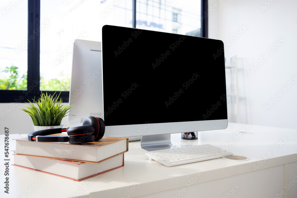 Poster desktop computer mockup on desk at home office, mock up display screen blank for template minimal st