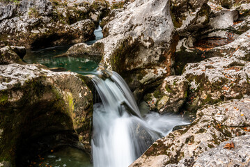 A stream flowing through the beautiful Mostnica Gorge in the Triglav National Park, located in the...