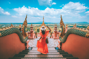 Traveler asian woman with dress travel in temple at Lampang Thailand