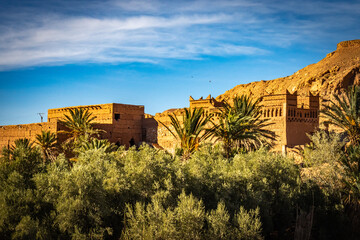 Fototapeta premium ait-ben-haddou, oasis, high atlas mountains, morocco, north africa, ait ben haddou, kasbah, adobe, sunset