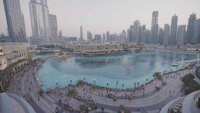 DUBAI, UNITED ARAB EMIRATES - NOVEMBER 20, 2022. Tilt Down Shot of The Dubai Fountain. Dubai Downtown. Modern. Luxury. 