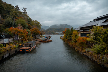 Fototapeta na wymiar Boats on a Kyoto Lake (Wide Shot)