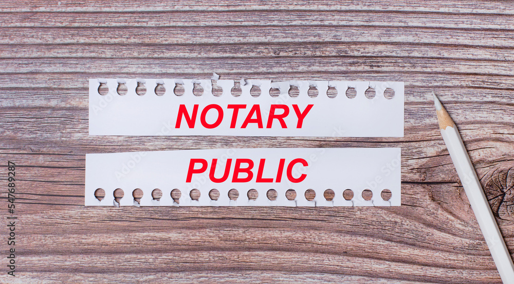 Poster background for text. white strips of paper with the text notary public and a white pencil next to it