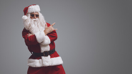 Cool rocking Santa Claus with sunglasses