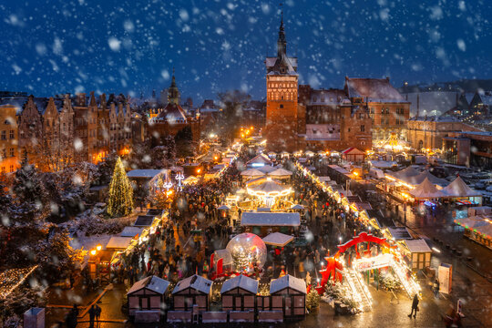 Beautifully lit Christmas market in the Main City of Gdansk during a snowfall. Poland