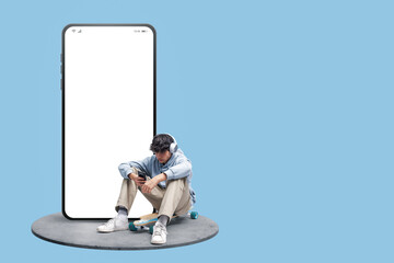 Teenage skater and big smartphone