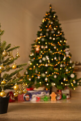 Christmas tree with decorations and snowflake on gold bokeh background. for Happy New Year 2023