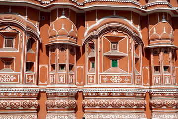 Hawa Mahal palace Jaipur, India. Facade of the palace of winds. Five floor exterior built like...