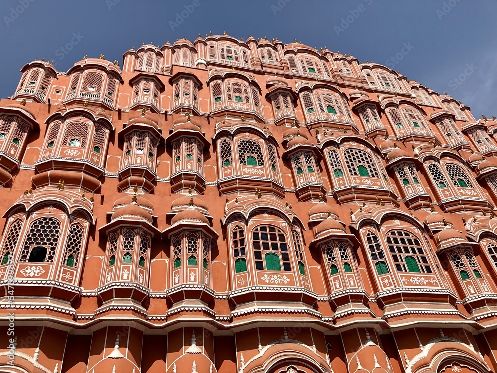 Wall mural hawa mahal palace jaipur, india. facade of the palace of winds. five floor exterior built like honey