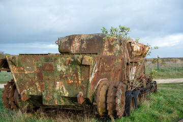 rust covered carcass of an abandoned vintage army battle tank