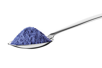 Teaspoon with butterfly pea flower powder or blue matcha tea isolated on white.