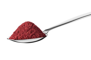 Teaspoon with dry ground sumac isolated on white.