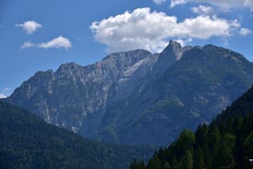 Fototapeta na wymiar Rocky mountains above the village of Auronzo