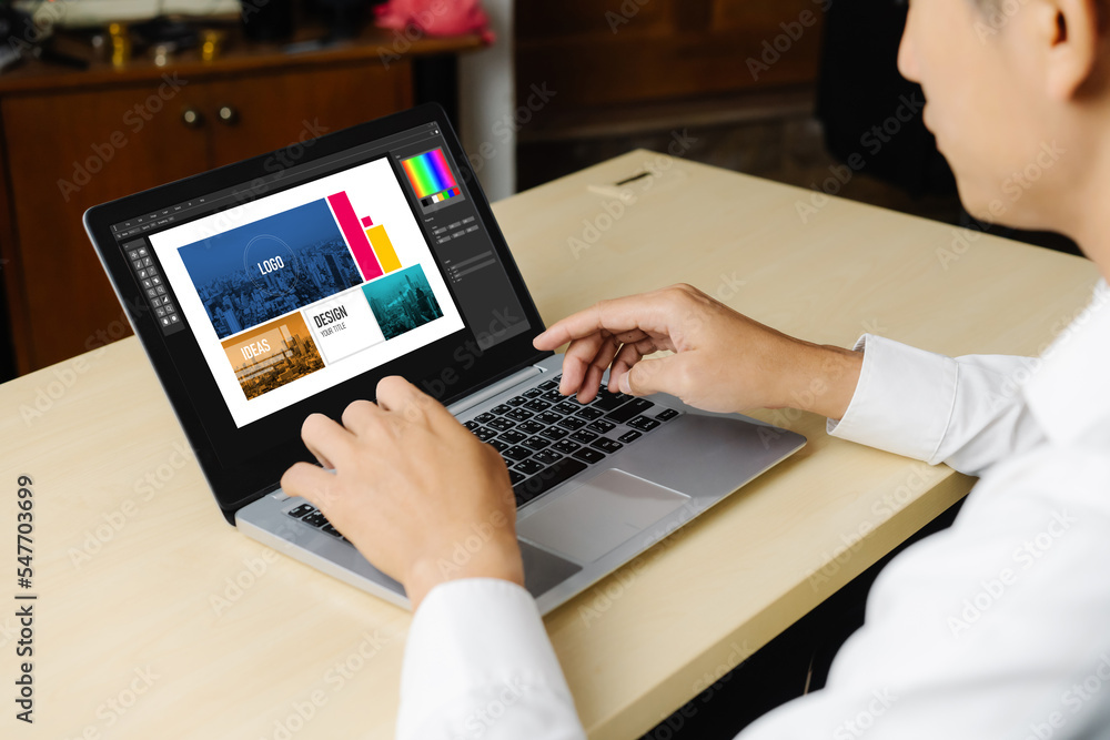 Poster graphic designer software for modern design of web page and commercial ads showing on the computer s