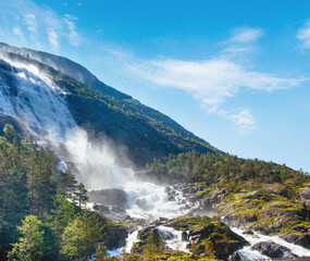 Summer Langfossen waterfall  (Norway).