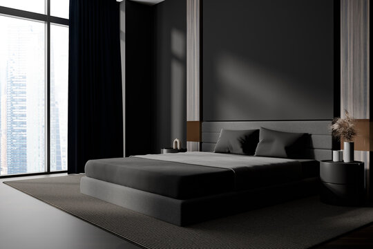 Dark bedroom interior with bed and nightstand, panoramic window. Mockup wall