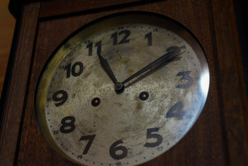 Vintage wall clock. In scratches and blemishes.