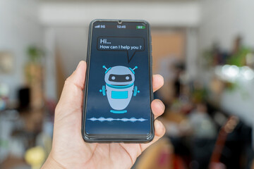 Customer and chatbot dialog on smartphone screen. AI. Artificial intelligence and service automation technology concept.