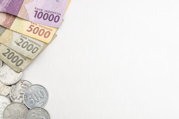 Indonesia Rupiah small changes. Monetary crisis and recession background wallpaper illustration. Uang receh Rupiah Indonesia. Official currency of Indonesia by Bank Indonesia.