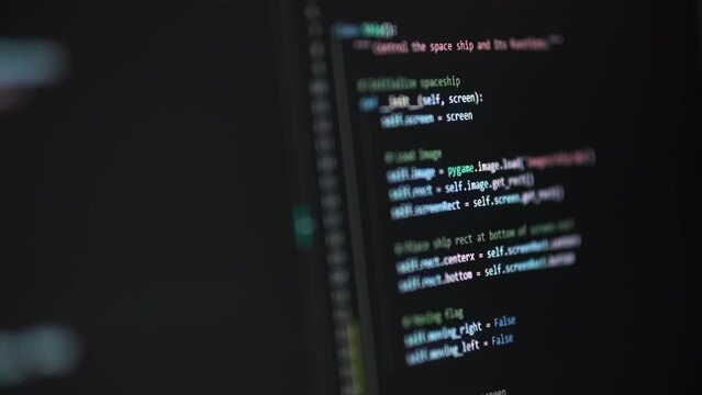 Developer is browsing html code on the computer screen. HTML Web Page Code Scrolling Programming code abstract technology background for software developer and Computer script concept
