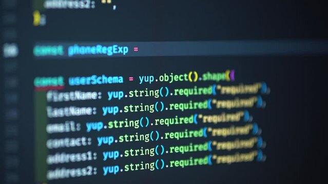 Developer is browsing html code on the computer screen. HTML Web Page Code Scrolling Programming code abstract technology background for software developer and Computer script concept
