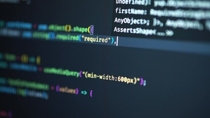 Developer is browsing html code on the computer screen. HTML Web Page Code Scrolling Programming code abstract technology background for software developer and Computer script concept
 - Powered by Adobe