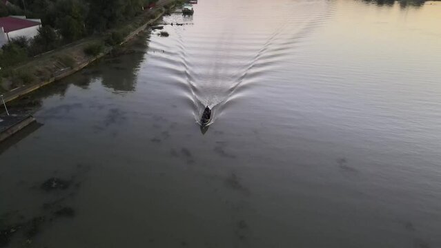 Drone view over the tiny village Mila 23 on the Danube river