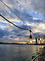 Lightened bulbs at the sunset on the riverside in Seoul