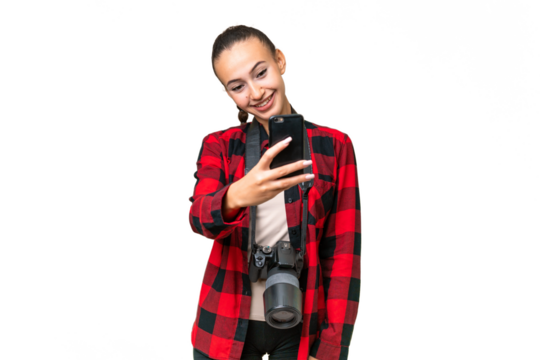 Young photographer Arab woman over isolated background making a selfie