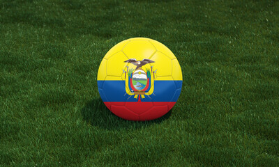Soccer ball with Ecuador flag colors at a stadium on green grasses background.