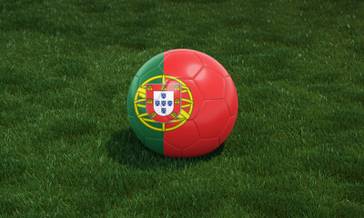 Soccer ball with Portugal flag colors at a stadium on green grasses background.