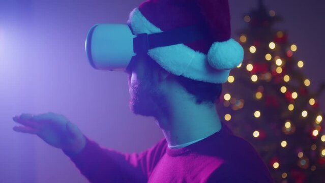 Man With VR Glass Under Christmas Tree