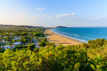 Vieste, Italy. View of Pizzomunno beach with the town of Vieste far in the background. September 9,...
