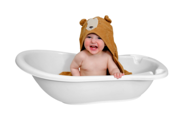 Screaming baby toddler boy with hooded towel in a tub, isolated on white background. Crying child at the age of one year
