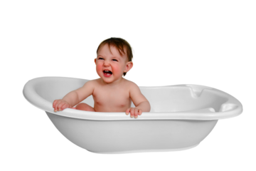 Shouting baby toddler boy is sitting in a bathtub, isolated on white background. Screaming child at the age of one year