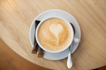 coffee with milk and heart on coffee