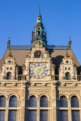 Fototapeta na wymiar Clock on the facade of the historic town hall in Liberec, Czech Republic