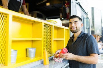 Happy customer receiving his fast food for lunch