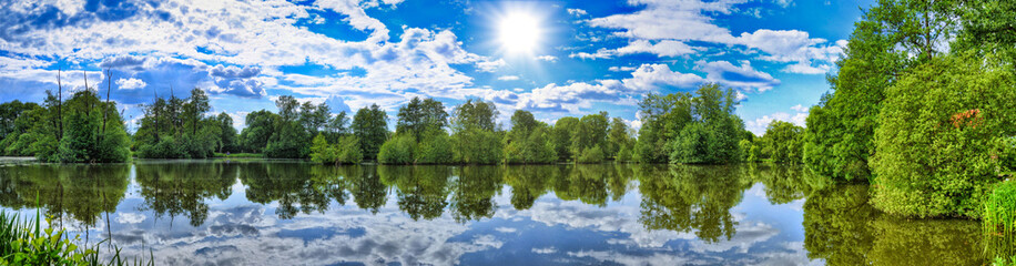 Fototapeta na wymiar Fulda river in Aueweiher Park in Fulda, Hessen, Germany panora