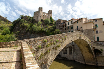 Fototapeta na wymiar Dolceacqua panorama with the ancient roman bridge made of stones and the castle