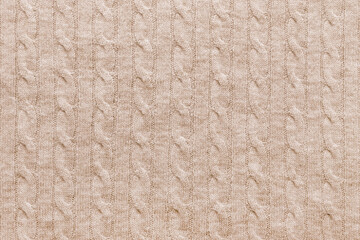 Beige knitted fabric background