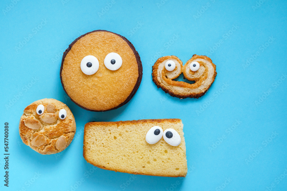 Wall mural funny cookies on blue background