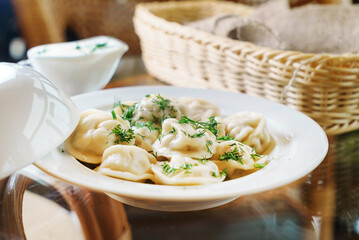 Russian pelmeni, dumplings with meat