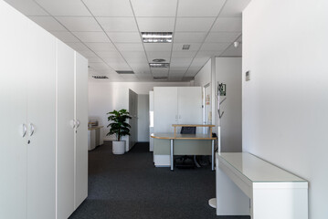 Empty places for workers in contemporary coworking. Startup business office interior at new workplace. Open space office interior