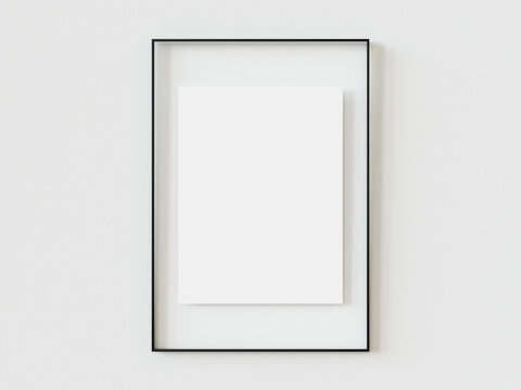Close up black picture frame, realistic vertical photo frame, A4. Empty white picture frame mockup template isolated on white wall indoors. Vector illustration. 3d illustration