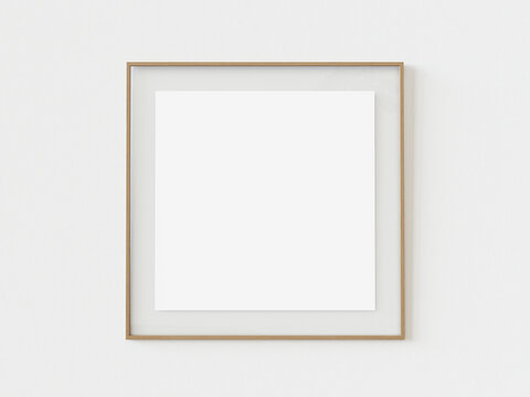 Wooden square photo frame on white wall background. Empty wooden picture photo frame mockup template isolated on white wall indoors. 3d illustration