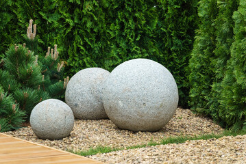 Stone balls. stone sphere. Garden sculptures