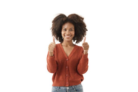 Young black woman in casual red knitted sweater smiling and thumb up, image with copy space on the isolation white background. the girl smile and looking at camera.