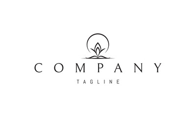 Vector logo on which an abstract image of a blossoming flower against the background of an inverted moon.